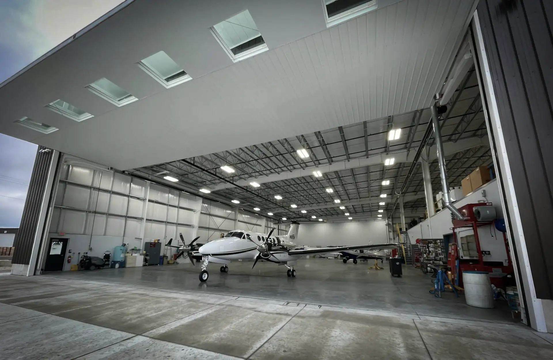 Insured hangar with aircraft in maintenance